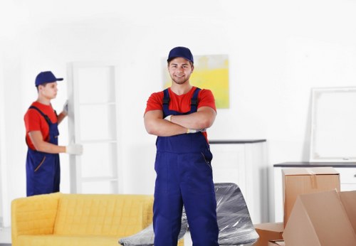 Flat removals team preparing furniture in a Harrow apartment building