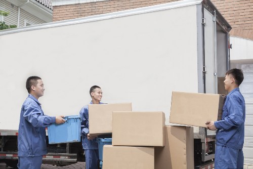 Removal team preparing household items in Harrow
