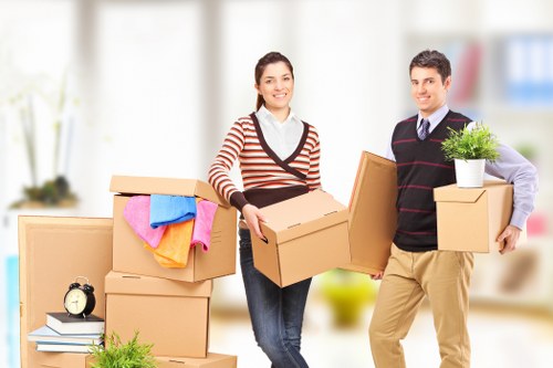 Packed boxes and furniture prepared for a domestic move in Harrow